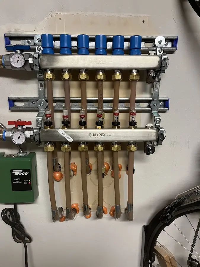 Plumber performing Water Heater Repair at a residential property in Pen Argyl